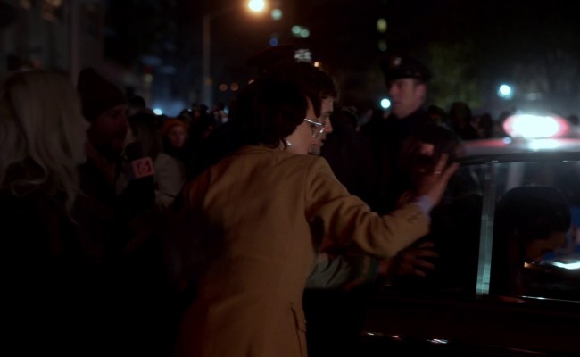 Crowd scene as Yoko Ono leaves the hospital