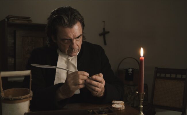 Photo 1 Bruce_Bozsum_as_Samson_Occom_making_letters_for_teaching